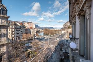 a view of a city from a building at Le Dubedout - Hyper Centre - Bastille in Grenoble