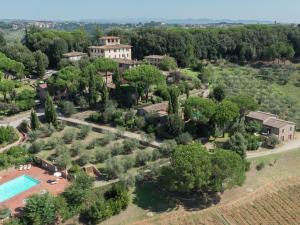 an aerial view of a estate with a swimming pool and trees at Villa in Siena with Pool and Tuscan Views in Siena +32 photos