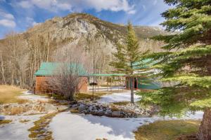 a cabin in the woods with a mountain at Boulder Dreams! Mtn-View Gem in McLeod in McLeod