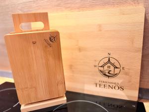 a wooden box sitting on top of a table at Ferienhaus Teenös in Hinte