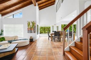 an open living room with a couch and a table at Home in Miami in Lindgren Acres