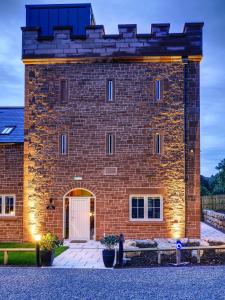 a large brick building with a white door at 3 Bed in Brampton oc-p34636 in Brampton