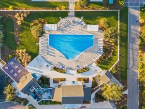 an overhead view of a building with a swimming pool at Barefoot at the Beach in Watersound Beach +19 photos