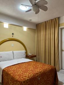 En eller flere senge i et værelse på Hotel Central Puebla + 83 billeder