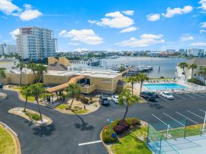an aerial view of a parking lot with a marina at Sandpiper Cove by Panhandle Getaways in Destin