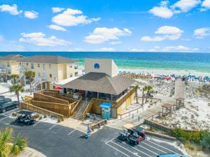 an aerial view of a resort with the beach at Sandpiper Cove by Panhandle Getaways in Destin
