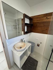 a bathroom with a sink and a toilet at Loft05 in Wankham