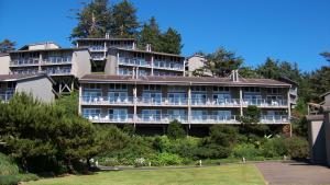 a large building with a lot of balconies at Inn at Otter Crest in Otter Rock