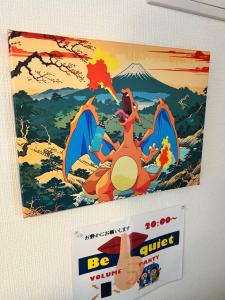 a poster for bequest hanging on a wall at ヴィオラ菊水 in Sapporo