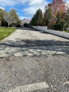 a large road with a white fence on it at Lehi East Bench Private Studio! in Lehi