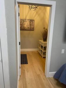 a hallway with a door open to a room at Lehi East Bench Private Studio! in Lehi