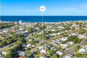 an aerial view of a suburb with a street sign at Solara Escape Mooloolaba - Luxe Pet-Friendly Home in Alexandra Headland