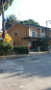 a house on the side of a street at Casa Vacanze Zadina in Cesenatico