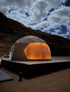 a tent in the middle of a desert at Rum Red Sand Luxury Camp & Jeep Tours in Wadi Rum +23 photos