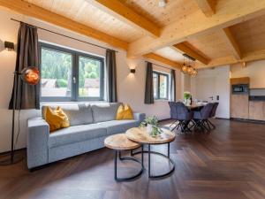a living room with a couch and a table at Obermöschach 10A in Obermöschach