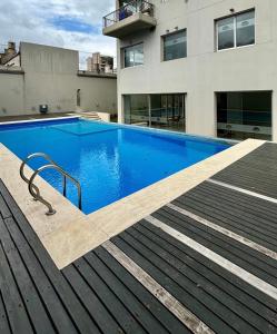 a swimming pool on top of a building at Portal del Sol in Junín