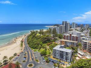 an aerial view of a city and the beach at Kirra Gardens Unit 9 in Gold Coast