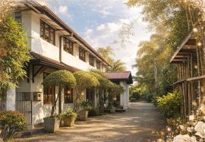 a building with plants on the side of it at The Manor 1926 in Colombo