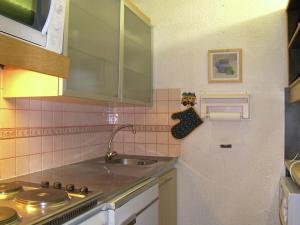 Holiday home Residence Arpasson Ii tesisinde mutfak veya mini mutfak