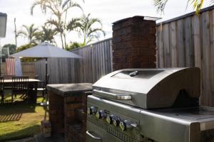 an outdoor grill with a toaster on top of it at 1-45 Beech Street in Evans Head