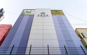 a building with a kia sign on the side of it at ZaZaHOTEL in Sosa