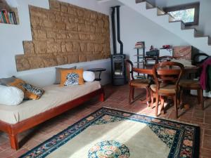 a living room with a couch and a table at Locazione del cavaliere in Fano