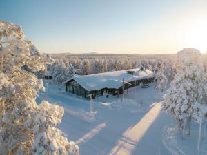 an aerial view of a building in the snow at Wilderness Hotel Kieppi in Saariselka