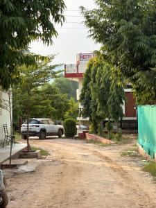 a dirt road in front of a hotel at Hotel Vishal in Jaipur