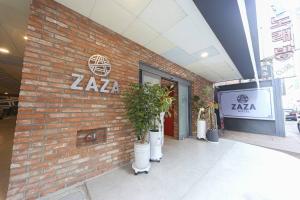 a brick building with a zaza sign on it at ZaZa HOTEL in Bucheon