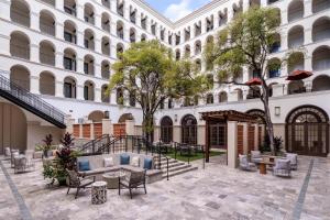 a rendering of the courtyard of a building at DoubleTree by Hilton Austin in Austin