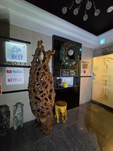 a statue of a fish on the floor of a store at 레이크모텔 in Tongsal-li
