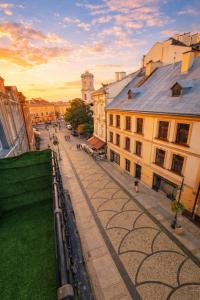 a view of a street in a city with buildings at Apartament Panorama Centrum in Przemyśl