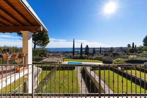a view from the balcony of a house at Bellavista by Whale Homes in Padenghe sul Garda