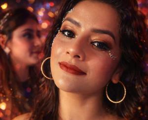 two women standing next to each other wearing earrings at Rozarios Aparts, Kochi in Cochin
