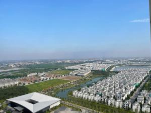 an aerial view of a city with a river and buildings at Homestay đẹp và rẻ r105 in Gia Lâm Pho