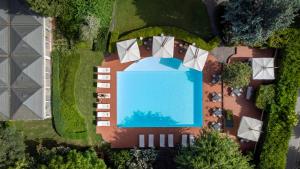an overhead view of a house with a swimming pool at Locanda I Girasoli in Misano Adriatico +69 photos