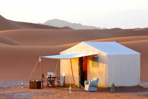 a tent in the middle of a desert at Platinum Heritage Desert Camp in Jaisalmer