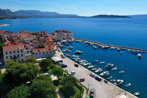 an aerial view of a harbor with boats in the water at CASA di NATALIA, Spacious 2BR Apartment for 6 near Beach ,Free Parking in Kaštela