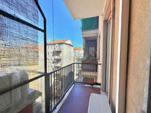 a balcony with a view of a building at Milano Suite Francine in Milan