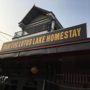 a building with a sign that reads ham coombs lake residence at Tam coc lotus lake homestay in Ninh Binh