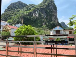 a view of a mountain from a balcony at Son Tinh Hotel in Phong Nha