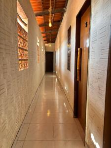 an empty hallway in a school building at Pousada Casa Marelle in Paracuru