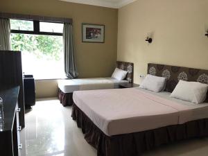 Postel nebo postele na pokoji v ubytování Anoi Itam Resort + 19 fotografií