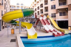 a water park with slides and a pool at Juliana Beach Hurghada in Hurghada