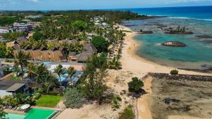 an aerial view of a resort on the beach at Seascape Villa in Pointe aux Biches
