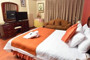 Postel nebo postele na pokoji v ubytování Hotel Makroz