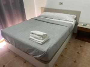 מיטה או מיטות בחדר ב-Hostal Treinta6
