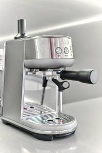 a coffee machine sitting on top of a counter at Velapi 23 in Roda