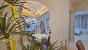 a dining room with a table and a mirror at Daegu-station 동성로 GoodLuck STAY in Daegu +93 photos