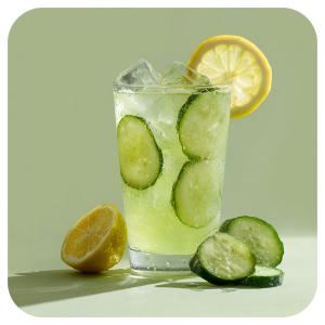 a drink with cucumbers and a slice of lemon at Scarlett Near Mount Zion Laguit Padilla in Bugallon